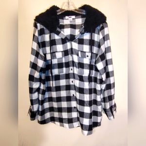 Checkered black and white long sleeve hooded shirt.